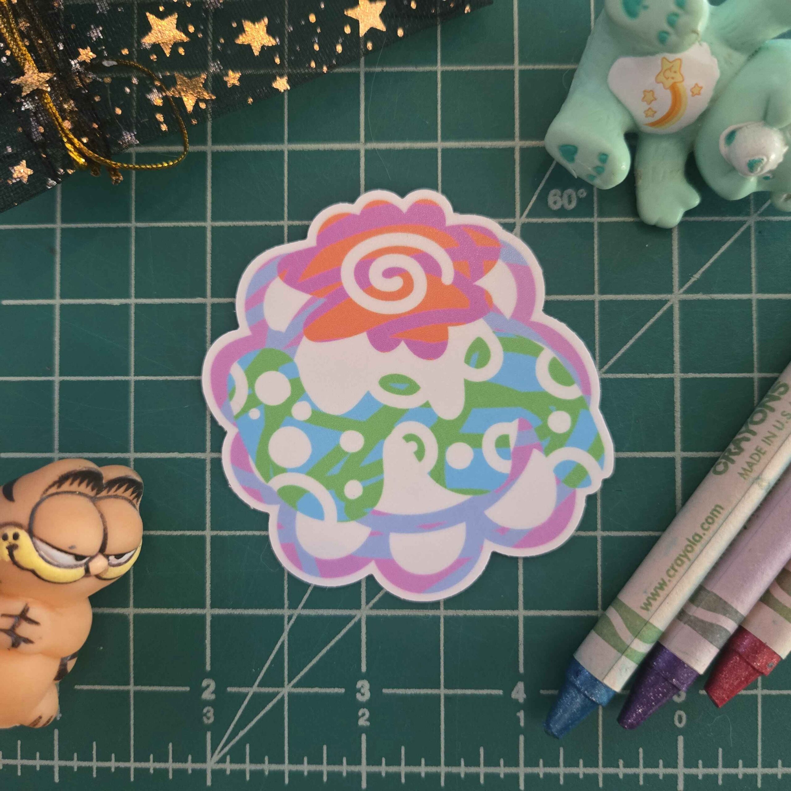 One of Mac's favorite things to draw is abstract florals. Here's a 2" x 2" matte vinyl sticker of one of his freaky flowers!