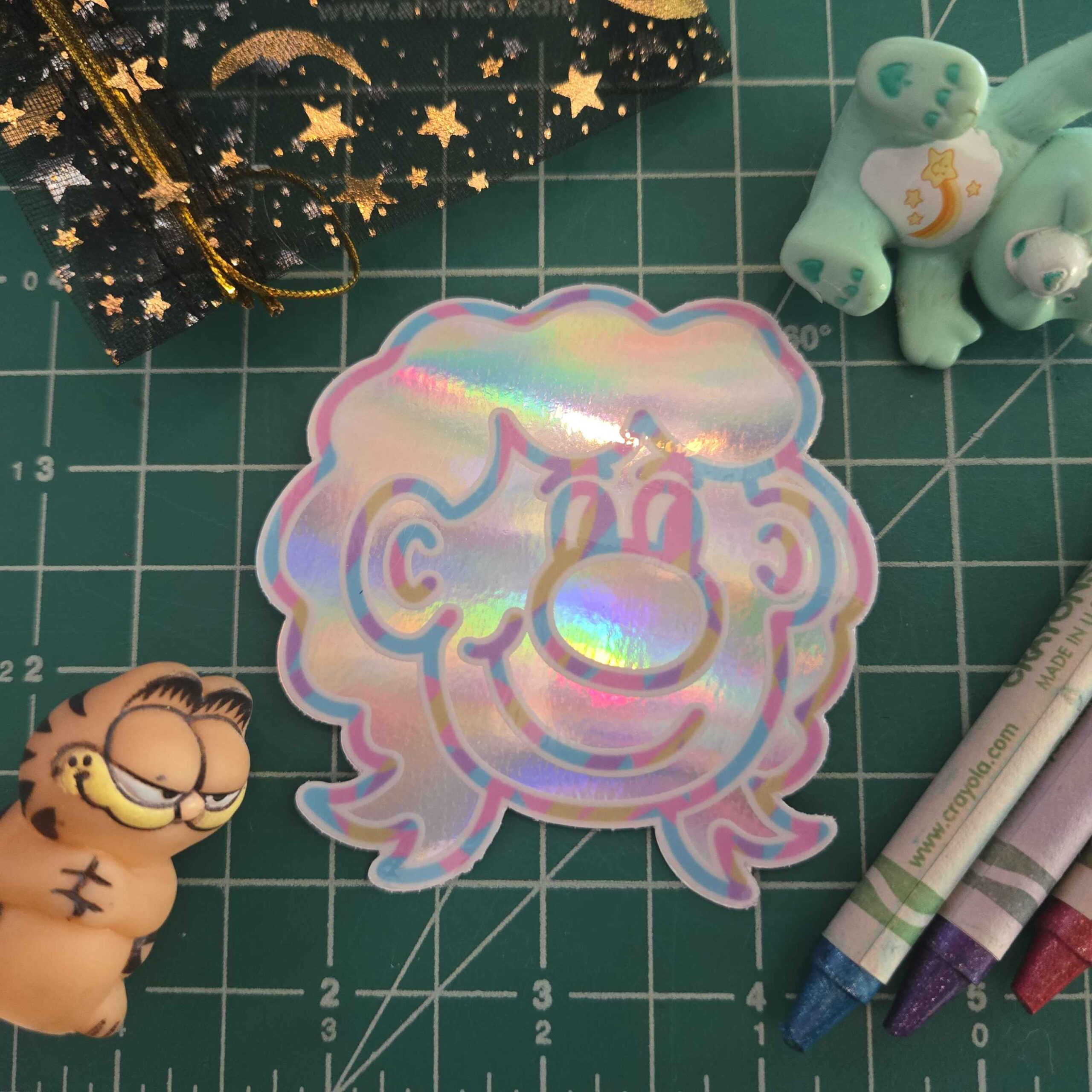 This is how Mac draws himself! Slap a Tiny Mac anywhere you wanna! 2.5" x 3" glossy holographic sticker.